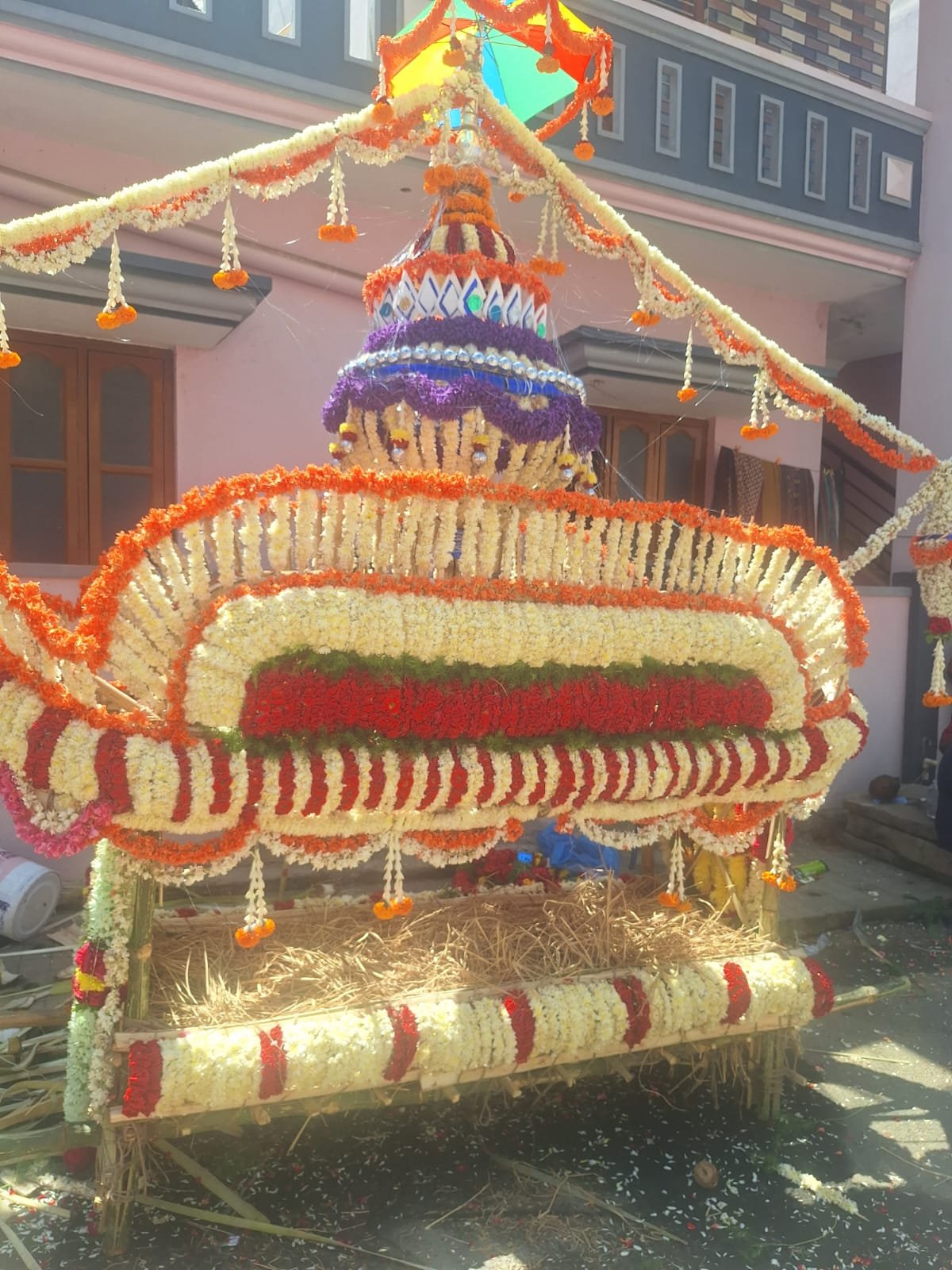 Floral arthi and funeral preparation arranged for Hindu final rites