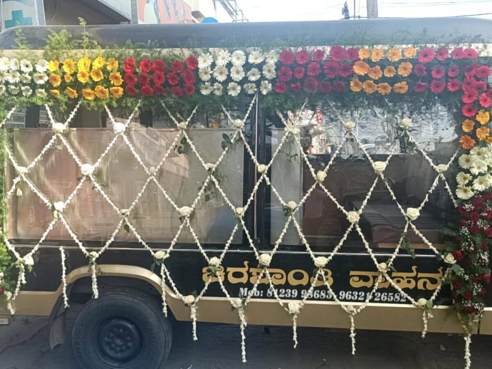 Glass Hearse Van for funeral services and cremation services in bangalore : Side Profile